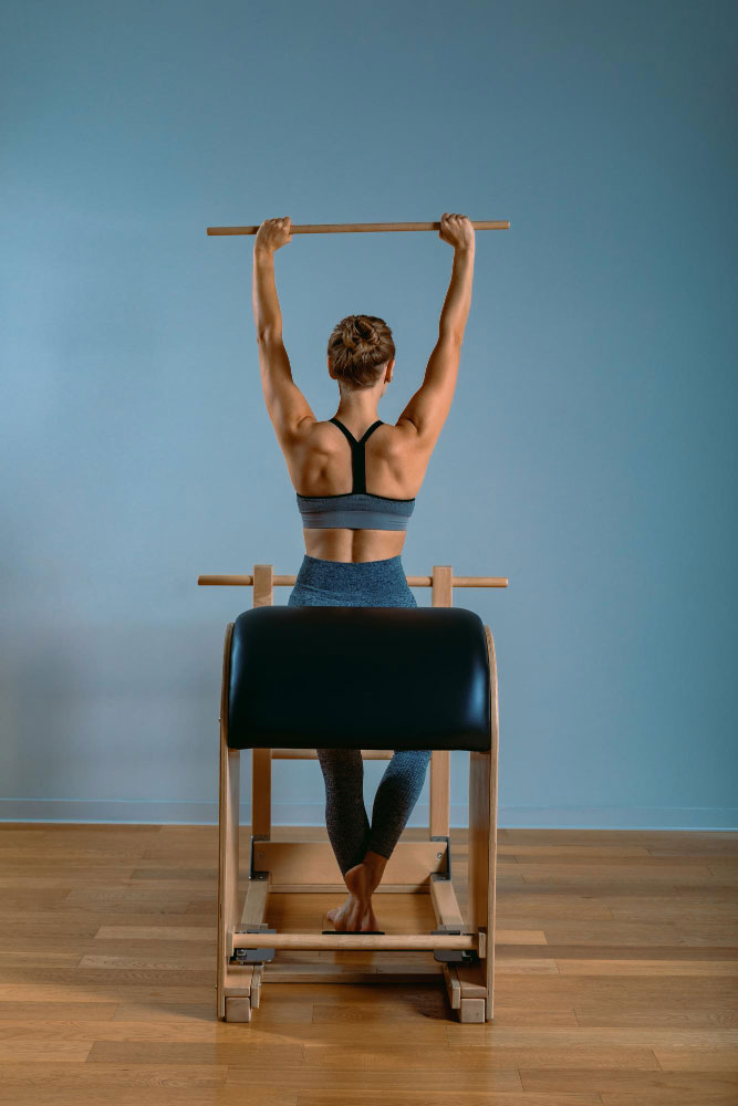 woman-doing-pilates woman-doing-pilates